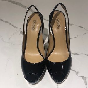 Michael Kors black patent peek a boo pump